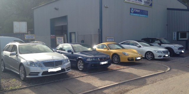 Building Cars parked outside Torbay Car Hospital